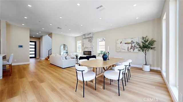 421 N Catalina St, Burbank, CA 91505 - dining space featuring light wood-style flooring, recessed lighting, and a fireplace
