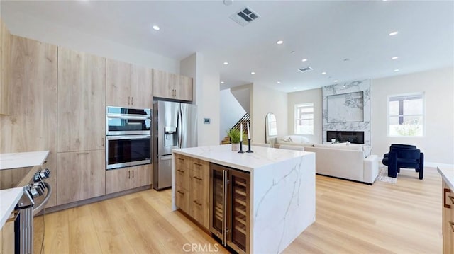 421 N Catalina St, Burbank, CA 91505 - kitchen with wine cooler, stainless steel appliances, a kitchen island, modern cabinets, and recessed lighting