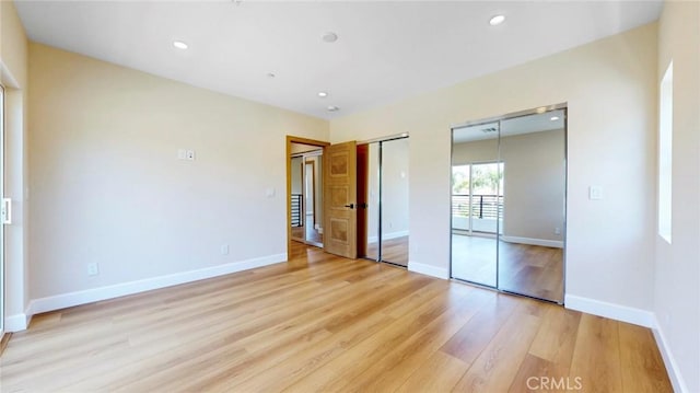 421 N Catalina St, Burbank, CA 91505 - unfurnished bedroom with multiple closets, light wood-style floors, and recessed lighting