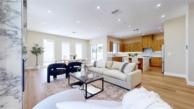 421 N Catalina St, Burbank, CA 91505 - living area with light wood-type flooring and recessed lighting