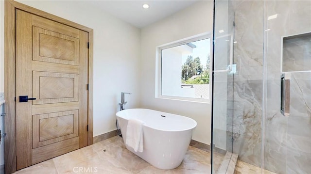 421 N Catalina St, Burbank, CA 91505 - full bathroom with a freestanding tub, a marble finish shower, and marble look tile flooring
