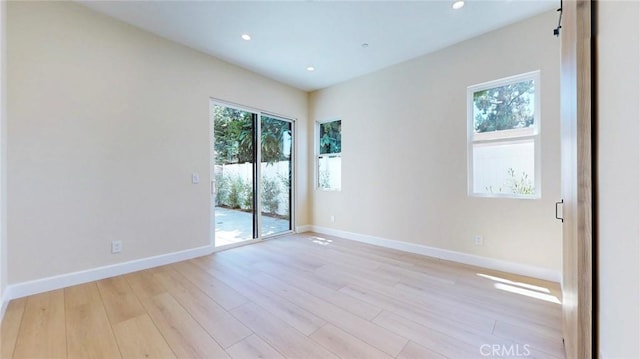 421 N Catalina St, Burbank, CA 91505 - empty room featuring light wood-style flooring and recessed lighting