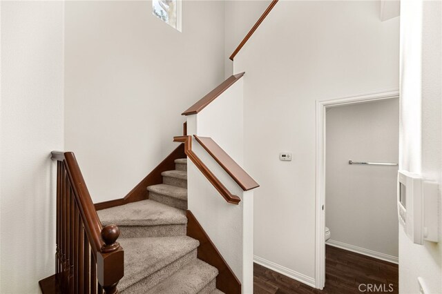 8495 E Preserve Loop, Chino, CA 91708 - stairs featuring wood finished floors and baseboards