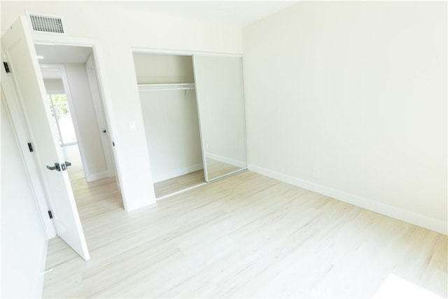 1925 Walnut Leaf Dr, Walnut, CA 91789 - unfurnished bedroom featuring light wood-style flooring and a closet