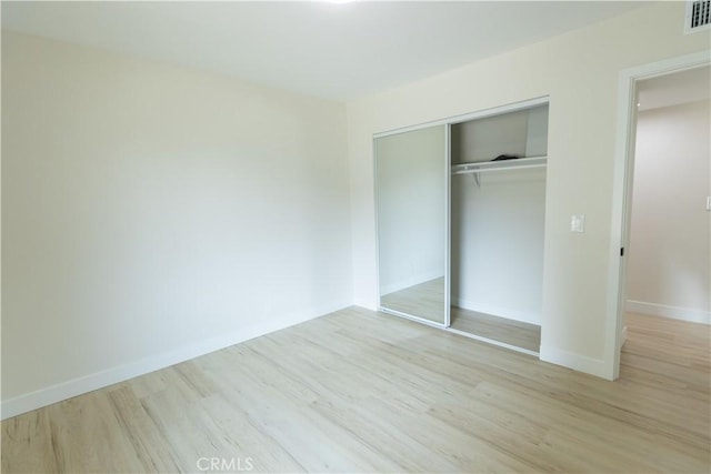 1925 Walnut Leaf Dr, Walnut, CA 91789 - unfurnished bedroom with wood finished floors and a closet