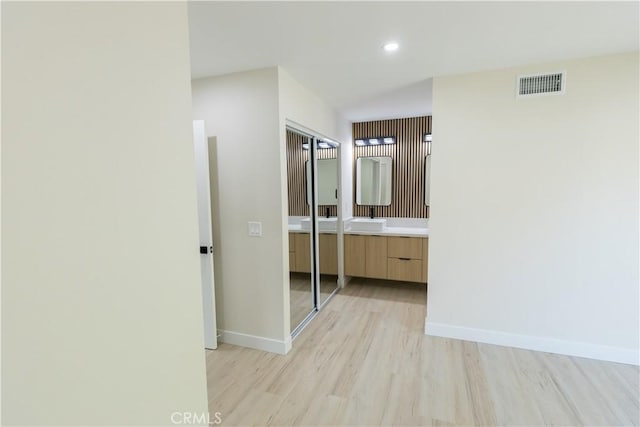 1925 Walnut Leaf Dr, Walnut, CA 91789 - hallway with light wood-type flooring and recessed lighting