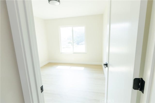 1925 Walnut Leaf Dr, Walnut, CA 91789 - unfurnished room with wood finished floors and baseboards