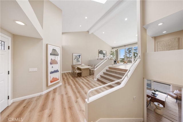 15 Valley Vw, Irvine, CA 92612 - stairs featuring wood finished floors, beamed ceiling, high vaulted ceiling, and recessed lighting