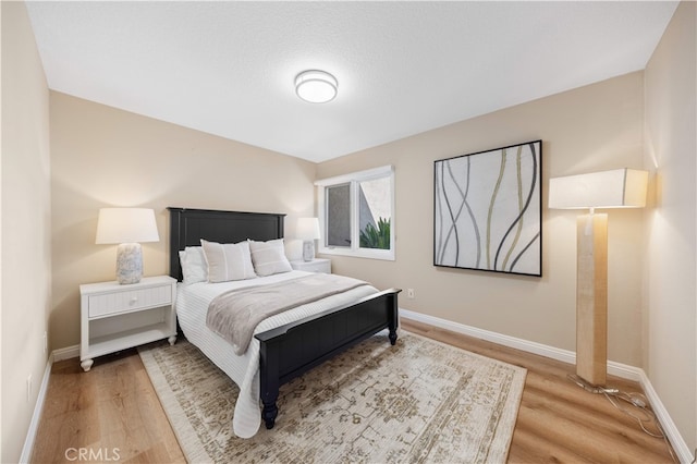 15 Valley Vw, Irvine, CA 92612 - bedroom with light wood-style flooring and baseboards