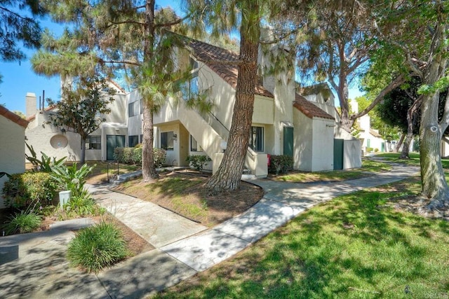 391 N Melrose Unit A, Vista, CA 92083 - view of front of property with stucco siding and a tile roof
