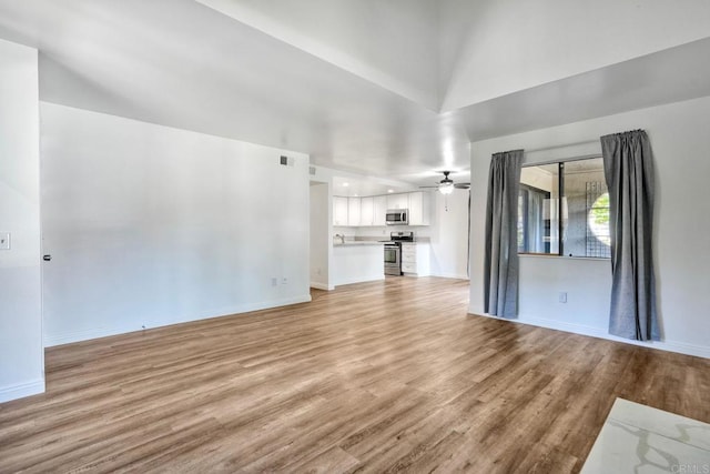 391 N Melrose Unit A, Vista, CA 92083 - unfurnished living room featuring light wood-type flooring and a ceiling fan