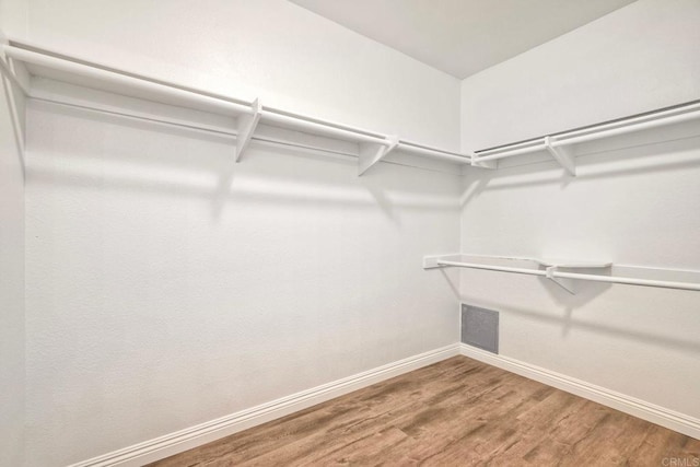 391 N Melrose Unit A, Vista, CA 92083 - walk in closet with wood finished floors
