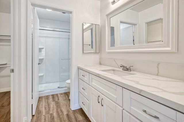 391 N Melrose Unit A, Vista, CA 92083 - full bathroom with a stall shower, wood finished floors, and vanity