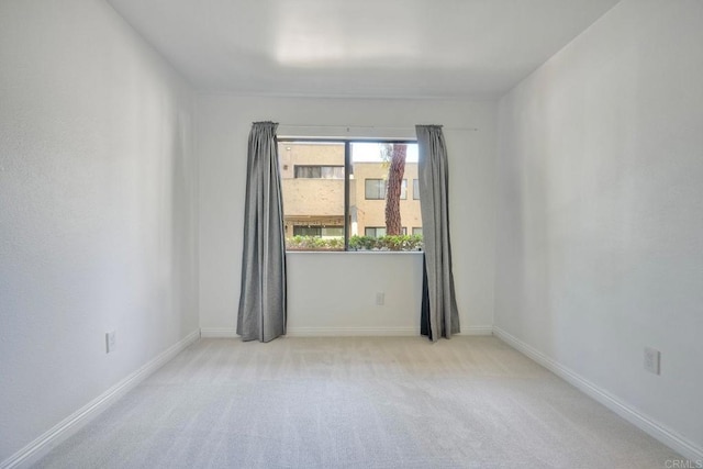 391 N Melrose Unit A, Vista, CA 92083 - carpeted empty room with baseboards