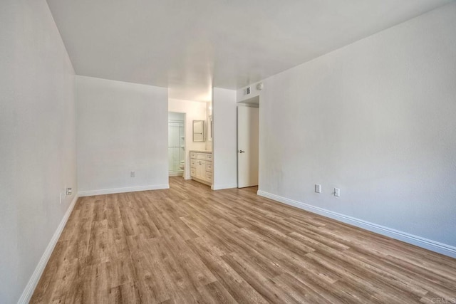 391 N Melrose Unit A, Vista, CA 92083 - unfurnished room featuring light wood-style floors and baseboards