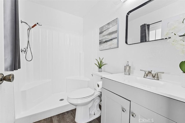 4268 Baggett Dr, Riverside, CA 92505 - bathroom with vanity, a shower with shower curtain, and wood finished floors