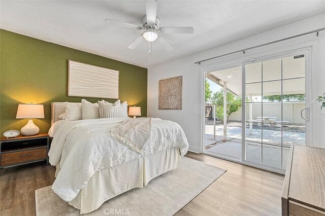 4268 Baggett Dr, Riverside, CA 92505 - bedroom with wood finished floors, access to exterior, and a ceiling fan