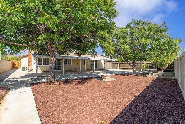 4268 Baggett Dr, Riverside, CA 92505 - fenced backyard with a patio area