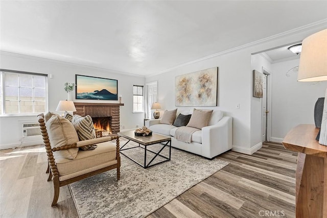 4268 Baggett Dr, Riverside, CA 92505 - living room featuring crown molding, wood finished floors, a fireplace, and a wall unit AC