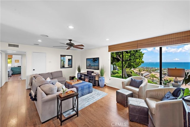 100 Calle Patricia Unit 1A, San Clemente, CA 92672 - living room with wood finished floors, recessed lighting, and ceiling fan