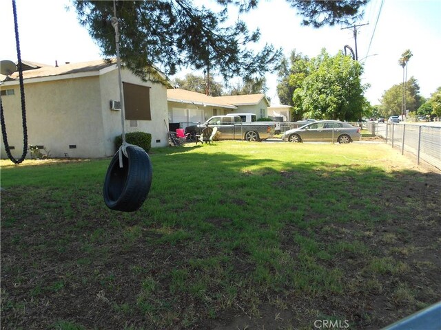 4121 Harrison St, Riverside, CA 92503 - view of yard featuring an attached garage