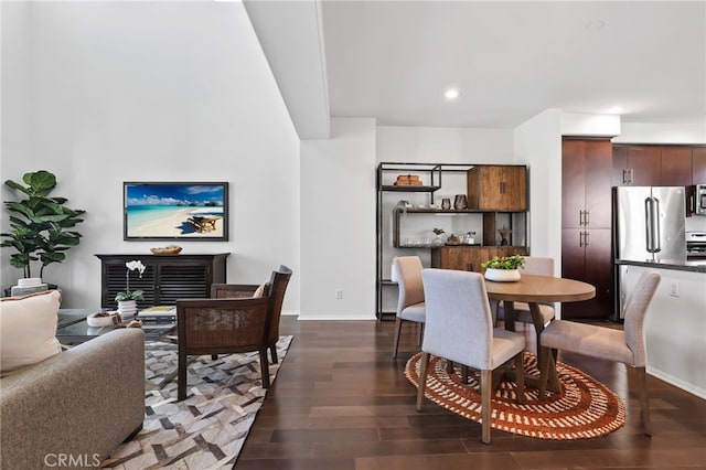 2950 19th St Unit 113, Signal Hill, CA 92707 - dining area featuring dark wood finished floors and recessed lighting