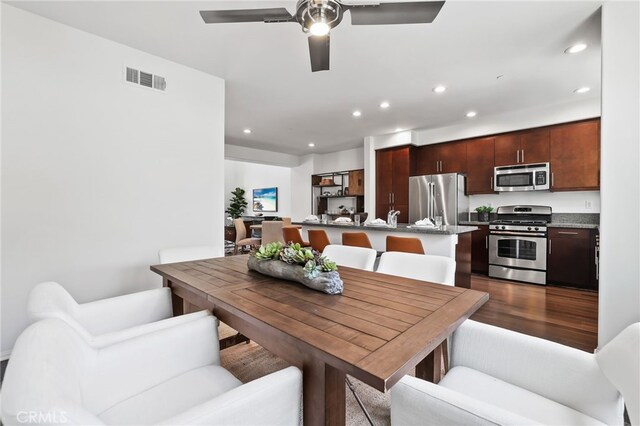 2950 19th St Unit 113, Signal Hill, CA 92707 - dining room featuring recessed lighting, a ceiling fan, and dark wood-style floors