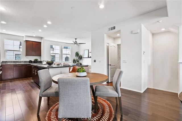 2950 19th St Unit 113, Signal Hill, CA 92707 - dining area featuring dark wood finished floors, ceiling fan, and recessed lighting