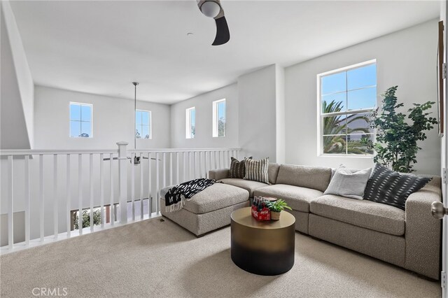 2950 19th St Unit 113, Signal Hill, CA 92707 - living room featuring carpet and ceiling fan