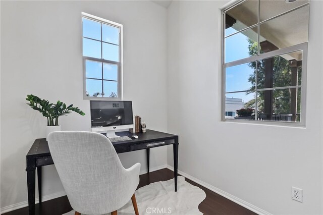 2950 19th St Unit 113, Signal Hill, CA 92707 - home office featuring baseboards and wood finished floors