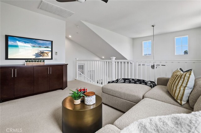 2950 19th St Unit 113, Signal Hill, CA 92707 - living area with ceiling fan, light carpet, and recessed lighting