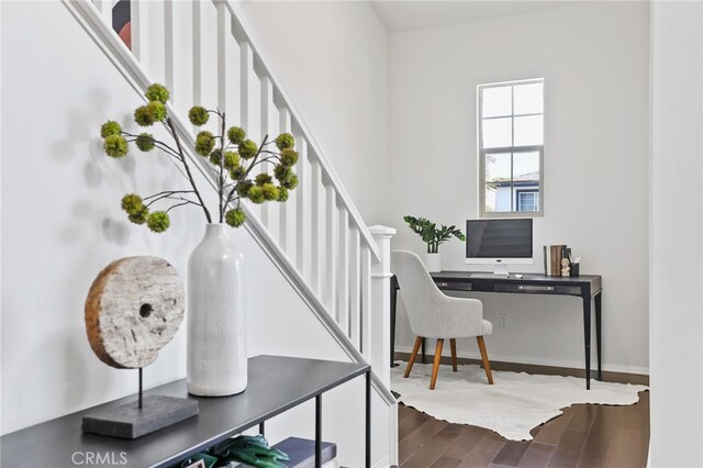 2950 19th St Unit 113, Signal Hill, CA 92707 - home office with dark wood-style floors and baseboards