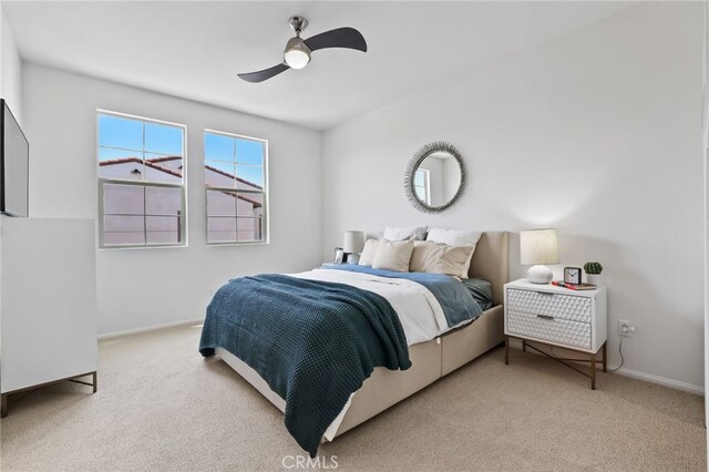 2950 19th St Unit 113, Signal Hill, CA 92707 - bedroom with light colored carpet and ceiling fan