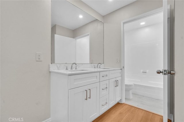 600 W 3rd St Unit C207, Santa Ana, CA 92701 - full bathroom featuring double vanity, wood finished floors, and recessed lighting
