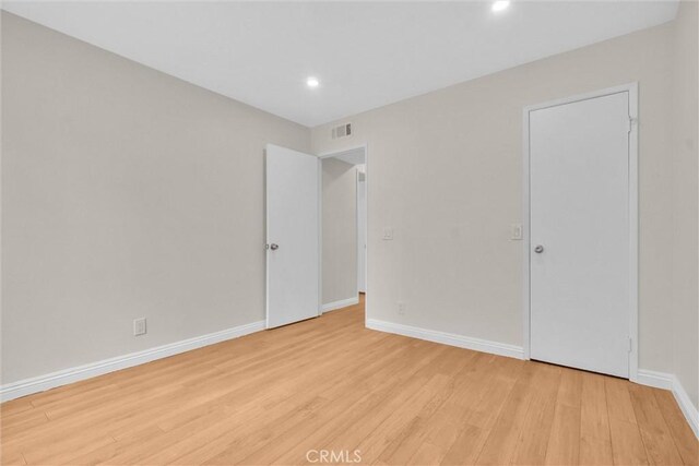 600 W 3rd St Unit C207, Santa Ana, CA 92701 - spare room featuring light wood-style floors and recessed lighting
