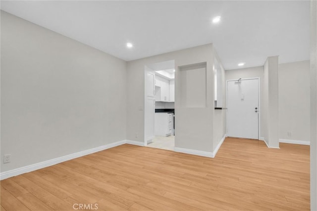 600 W 3rd St Unit C207, Santa Ana, CA 92701 - empty room with light wood-style floors and recessed lighting