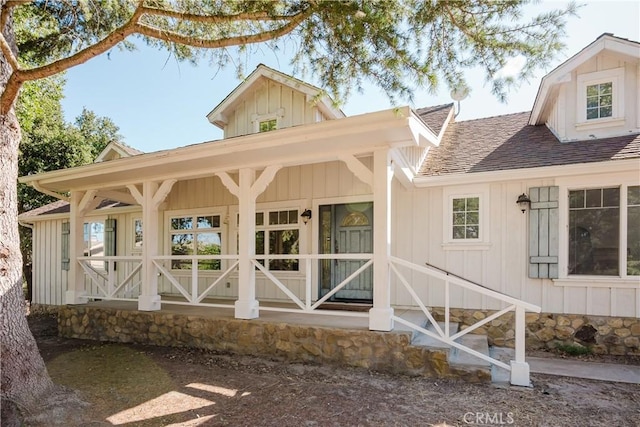 40 Bobcat Springs Rd, Buellton, CA 93427 - back of house with a shingled roof, board and batten siding, and a porch