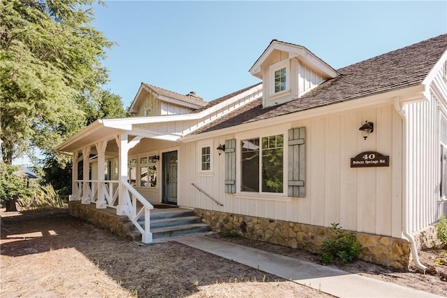 40 Bobcat Springs Rd, Buellton, CA 93427 - modern inspired farmhouse with a porch and stone siding
