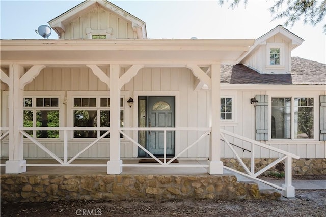 40 Bobcat Springs Rd, Buellton, CA 93427 - view of exterior entry with a shingled roof and board and batten siding
