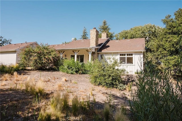 40 Bobcat Springs Rd, Buellton, CA 93427 - rear view of property with a chimney and board and batten siding