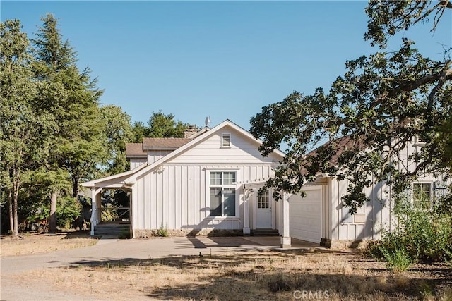 40 Bobcat Springs Rd, Buellton, CA 93427 - view of front of house featuring board and batten siding, a garage, and concrete driveway