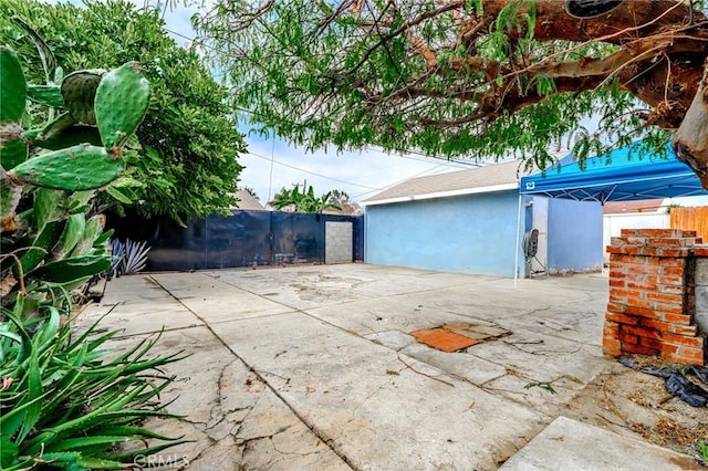 13018 Rosecrans Ave, Norwalk, CA 90650 - fenced backyard with a patio