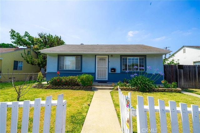 13018 Rosecrans Ave, Norwalk, CA 90650 - bungalow with stucco siding and a fenced backyard