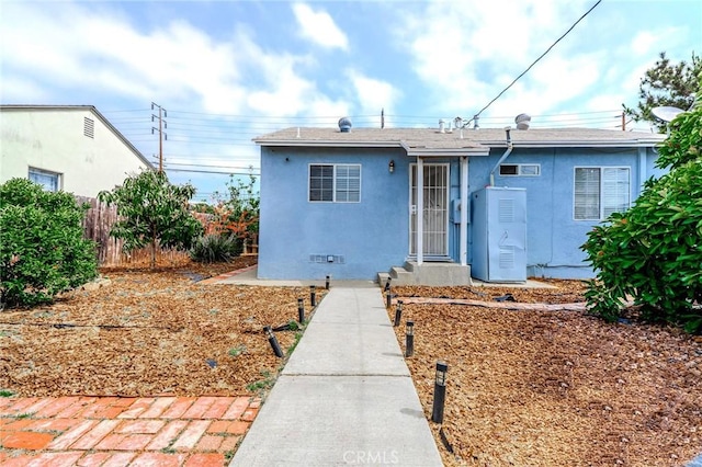 13018 Rosecrans Ave, Norwalk, CA 90650 - view of front of house with stucco siding and roof with shingles