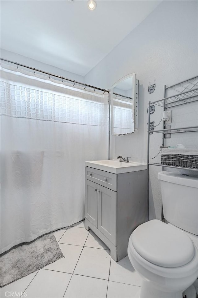 13018 Rosecrans Ave, Norwalk, CA 90650 - bathroom featuring vanity, tile patterned flooring, and a shower with curtain