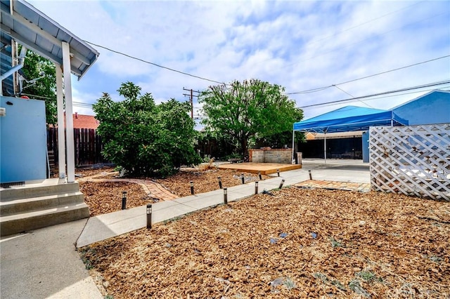 13018 Rosecrans Ave, Norwalk, CA 90650 - view of yard featuring a patio