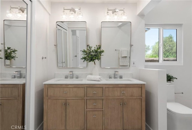 22 Sage Cyn, Pomona, CA 91766 - bathroom with double vanity and toilet
