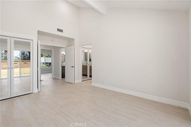 22 Sage Cyn, Pomona, CA 91766 - unfurnished room featuring french doors, beamed ceiling, light wood-style floors, and high vaulted ceiling