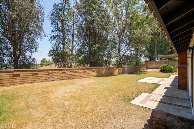 22 Sage Cyn, Pomona, CA 91766 - fenced backyard with a patio