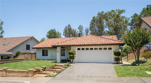 22 Sage Cyn, Pomona, CA 91766 - view of front of home with a tile roof, driveway, stucco siding, an attached garage, and a front lawn
